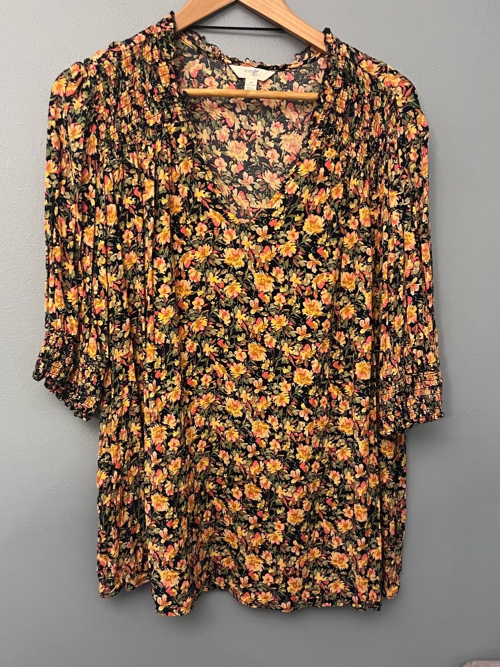 Terra & Sky Black Floral V-Neck Smocked Blouse with Yellow and Pink Flowers